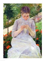 Young Woman Sewing in the garden Framed Print