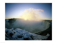 Sunrise over a waterfall, Niagara Falls, Ontario, Canada Framed Print