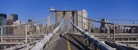 Rear view of a woman walking on a bridge, Brooklyn Bridge, Manhattan, New York City, New York State, USA Fine Art Print