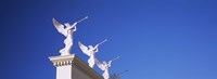 Low angle view of statues on a wall, Caesars Place, Las Vegas, Nevada, USA Fine Art Print