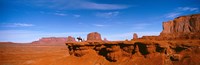 Person riding a horse on a landscape, Monument Valley, Arizona, USA Fine Art Print