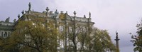 Tree in front of a palace, Winter Palace, State Hermitage Museum, St. Petersburg, Russia Fine Art Print