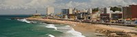 Tourists on the Porto Da Barra Beach with Farol Da Barra Lighthouse in background, Salvador, Bahia, Brazil Fine Art Print