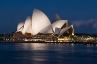 Australia, Sydney Opera House at night on waterfront Framed Print