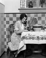 1920s Woman Sitting At Kitchen Table Fine Art Print