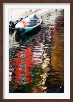 Houses and boat reflected in Lake Como, Varenna, Lombardy, Italy Fine Art Print