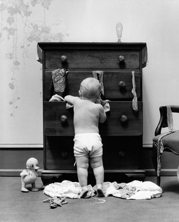 1940s Toddler Baby Pulling Clothes Out Of Bureau Fine Art Print by Vintage  PI at FulcrumGallery.com