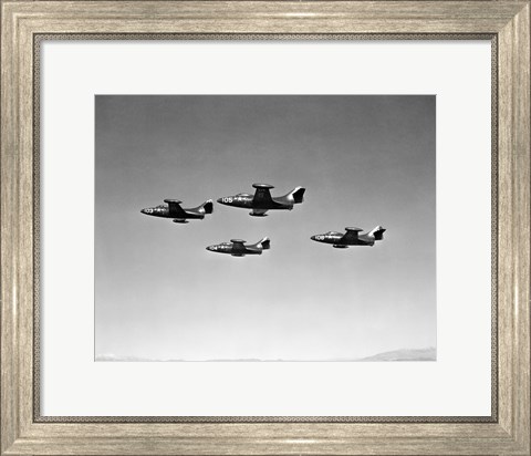 Framed Low angle view of four fighter planes flying in formation, F9F Panther Print