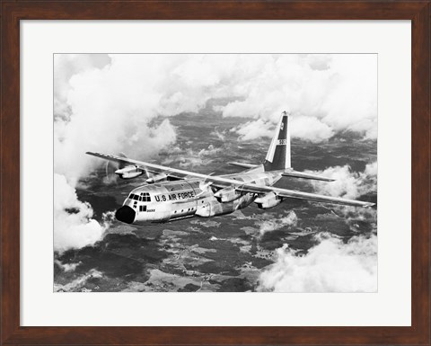 Framed High angle view of a military airplane in flight, C-130 Hercules Print