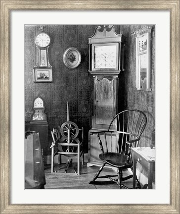 Framed Antique clocks in a living room Print