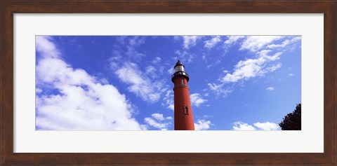 Framed Low angle view of a lighthouse, Ponce De Leon Inlet Lighthouse, Ponce Inlet, Volusia County, Florida, USA Print