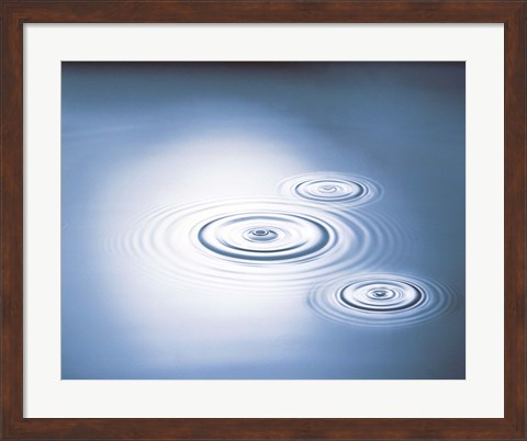 Framed Three rings in grey tinted water with bright light Print