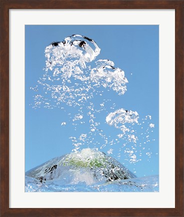 Framed Churning bubbles rising upwards in blue water Print