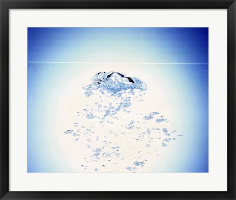 Framed Churning bubbles rising upwards with bright light background Print