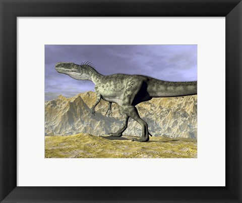 Framed Monolophosaurus dinosaur walking on rocky terrain near mountain Print