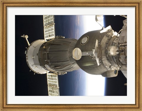 Framed Soyuz spacecraft backdropped by Earth Print