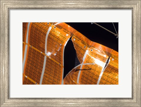 Framed Close-up of a Tear in Solar Array Material on the International Space Station Print