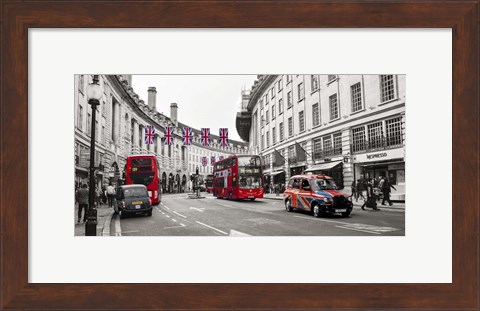 Framed Buses and taxis in Oxford Street, London Print